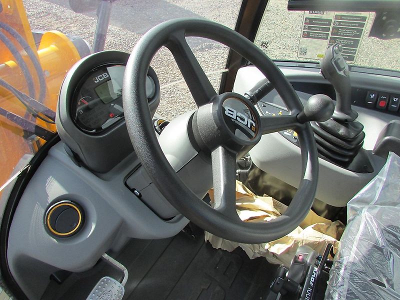 JCB 409 Radlader mit Schaufel und Gabel